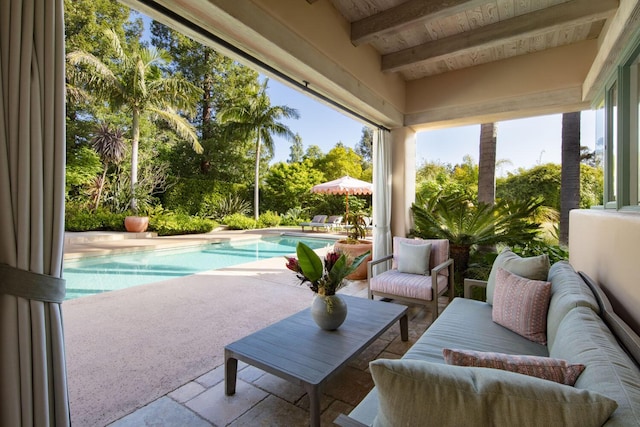 view of patio / terrace with an outdoor pool and an outdoor living space