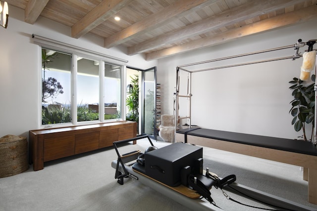 exercise room featuring carpet, wood ceiling, and recessed lighting