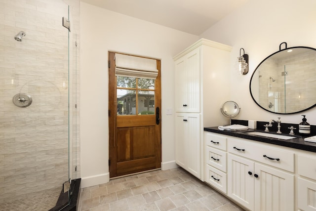 bathroom featuring vanity and walk in shower