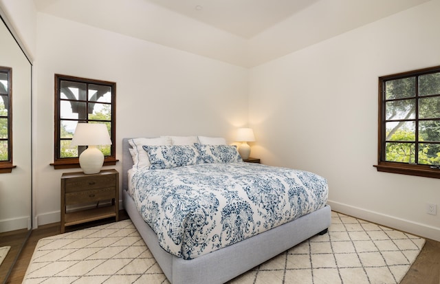 bedroom featuring light wood-type flooring