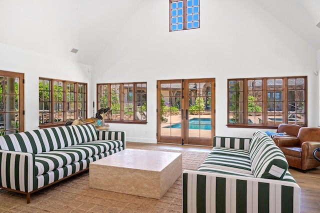 sunroom / solarium with french doors and vaulted ceiling