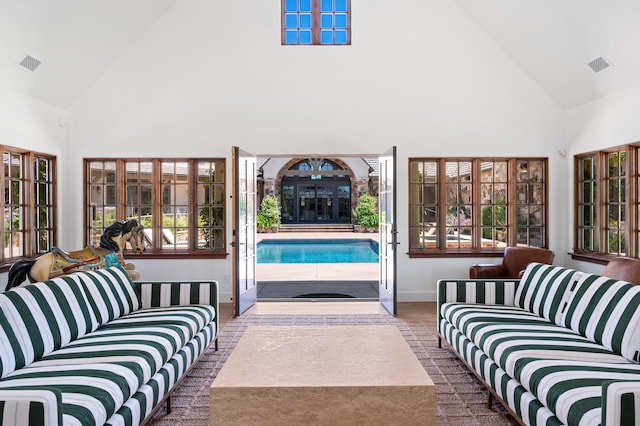 sunroom featuring lofted ceiling