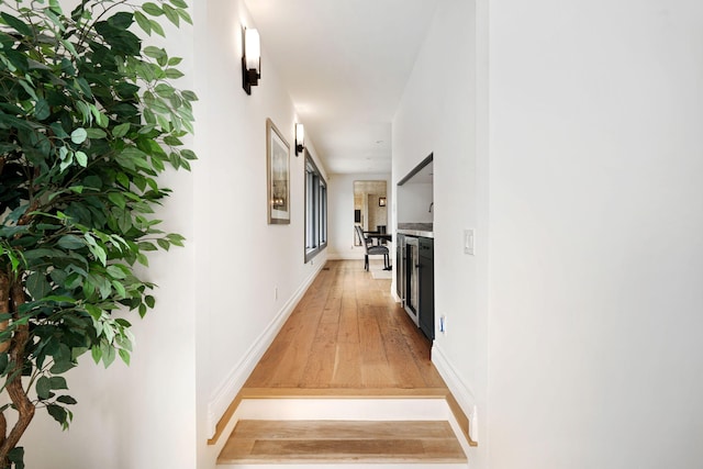 corridor featuring light hardwood / wood-style flooring