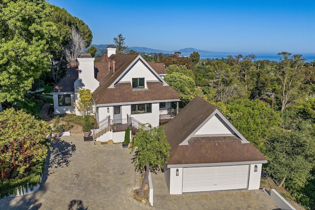 exterior space featuring a mountain view and a garage