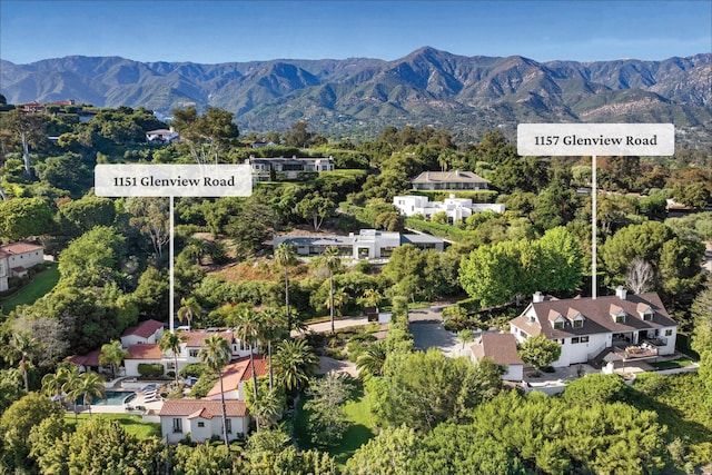 drone / aerial view featuring a mountain view