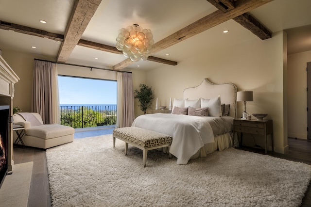 bedroom with baseboards, wood finished floors, access to exterior, beam ceiling, and recessed lighting