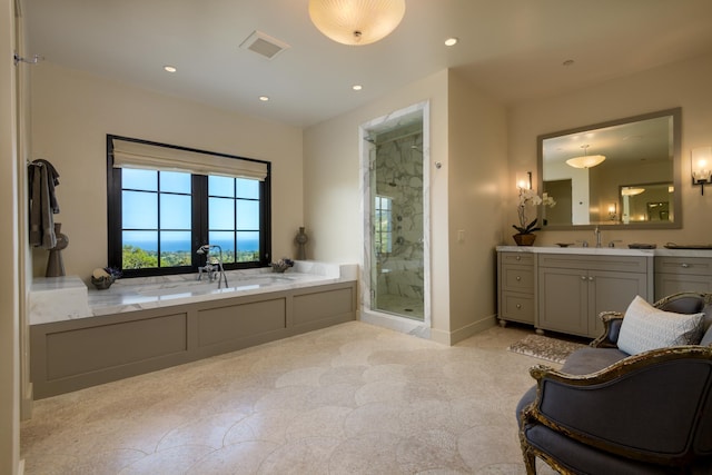 full bathroom with a stall shower, visible vents, a garden tub, vanity, and recessed lighting