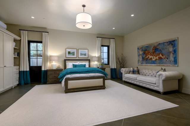 bedroom with recessed lighting and multiple windows