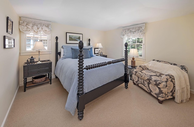 bedroom with light colored carpet