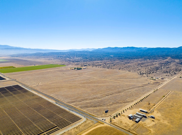 aerial view with a mountain view and a rural view