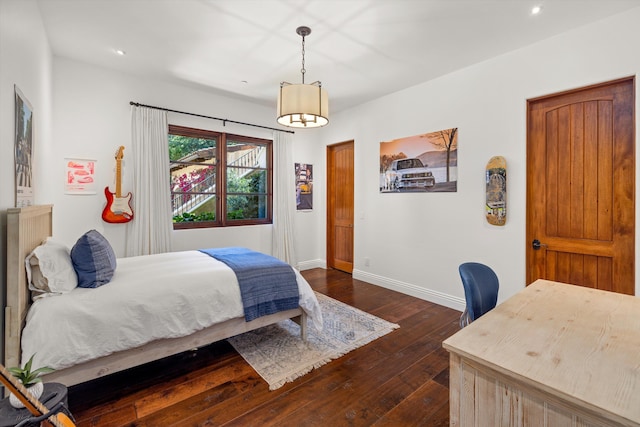 bedroom featuring dark hardwood / wood-style floors