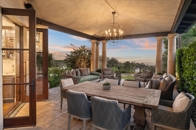 view of patio terrace at dusk