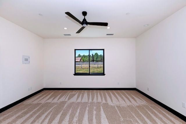 unfurnished room featuring carpet flooring and ceiling fan