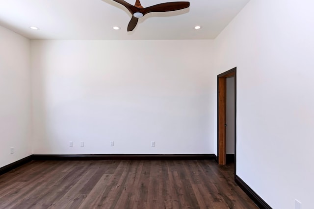 unfurnished room featuring dark hardwood / wood-style flooring and ceiling fan