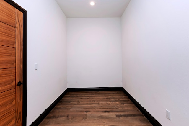 spare room featuring dark hardwood / wood-style floors