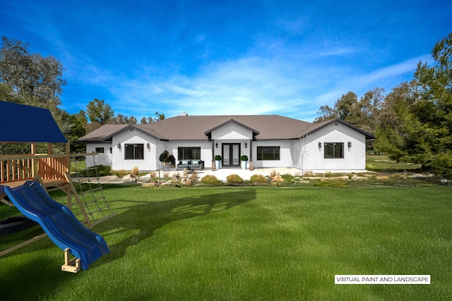 view of front of property featuring a patio area, a playground, and a front lawn