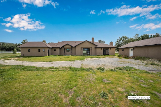 view of front of property with a front yard