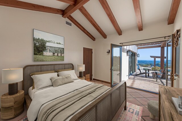 tiled bedroom with access to outside and vaulted ceiling with beams