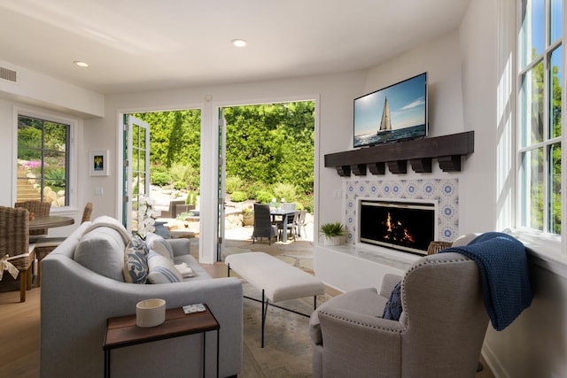 living room featuring hardwood / wood-style floors and a fireplace