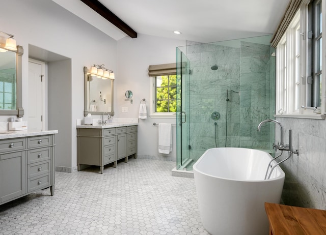 bathroom with tile patterned flooring, vaulted ceiling with beams, vanity, and independent shower and bath