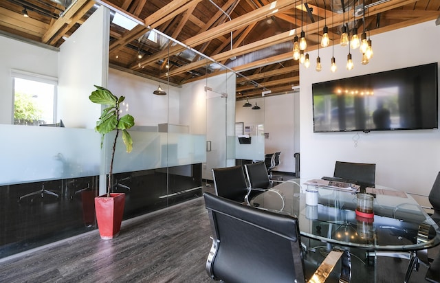 dining area featuring beam ceiling, high vaulted ceiling, wood ceiling, and hardwood / wood-style flooring