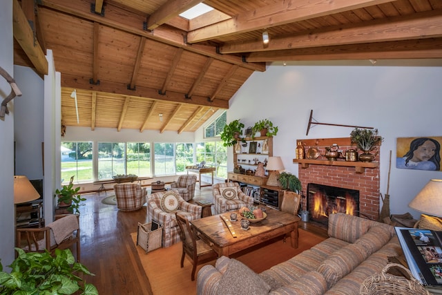 living room featuring vaulted ceiling with beams, a brick fireplace, hardwood / wood-style floors, and wood ceiling