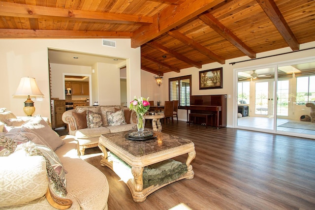 living room with lofted ceiling with beams, hardwood / wood-style floors, ceiling fan, and wood ceiling