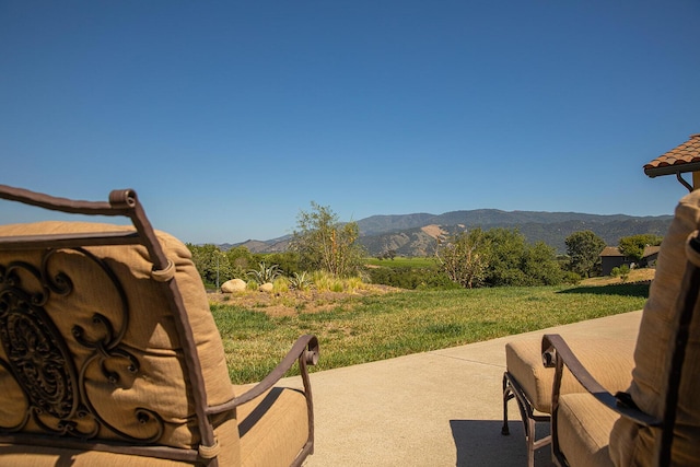 exterior space featuring a mountain view