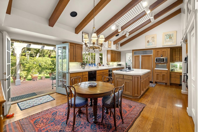 dining room featuring beam ceiling, light hardwood / wood-style flooring, a chandelier, wine cooler, and high vaulted ceiling