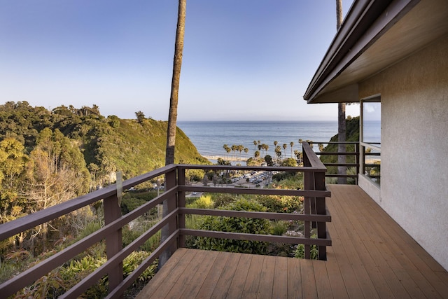 deck featuring a water view