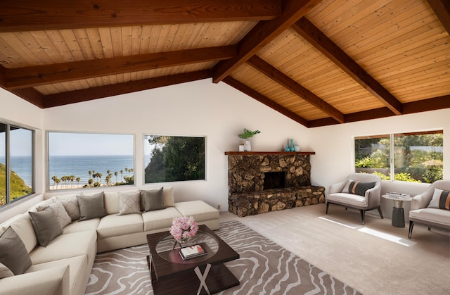 carpeted living room with a water view, vaulted ceiling with beams, and wood ceiling