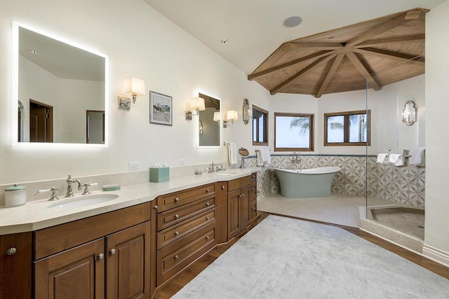 bathroom featuring wooden ceiling, vaulted ceiling with beams, vanity, independent shower and bath, and hardwood / wood-style flooring