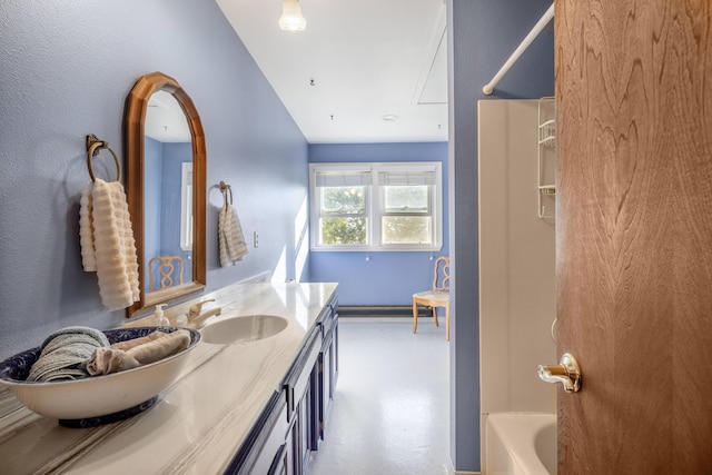 bathroom with shower / washtub combination, vaulted ceiling, and vanity