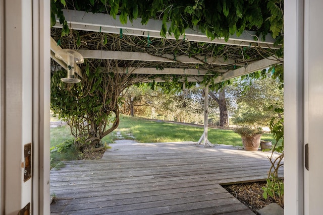 wooden deck with a yard