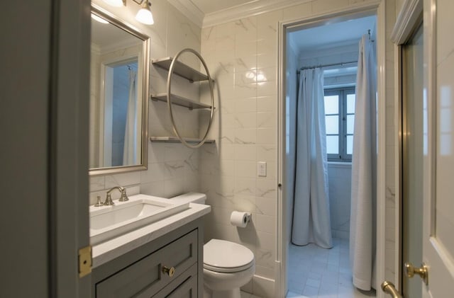 5415 Campbell Rd, Lompoc, CA 93436 - bathroom featuring ornamental molding, tile walls, toilet, vanity, and tile patterned flooring