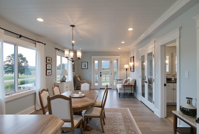 5415 Campbell Rd, Lompoc, CA 93436 - dining area featuring french doors, recessed lighting, wood finished floors, baseboards, and a chandelier