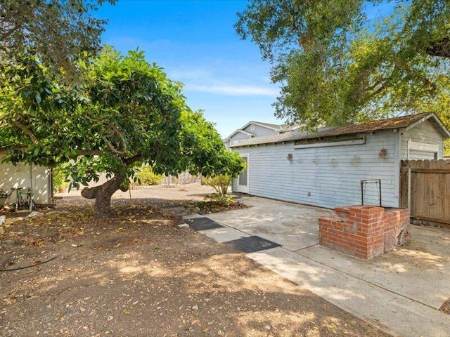 exterior space with a patio area and fence