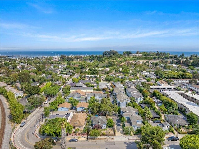 bird's eye view with a water view and a residential view