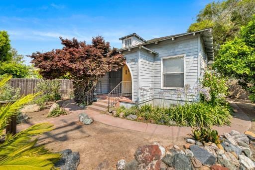 view of front of property with fence