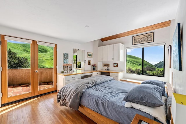 bedroom with light hardwood / wood-style floors