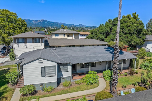 view of front of home with a mountain view