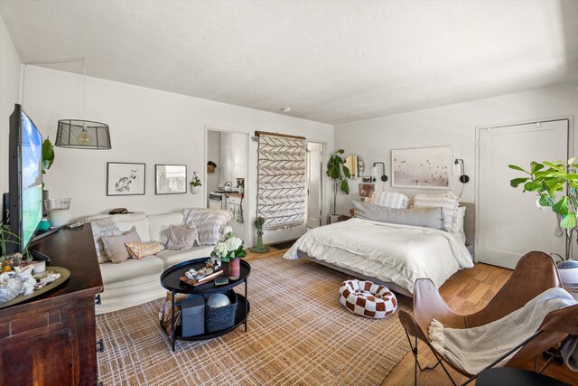 bedroom featuring hardwood / wood-style flooring