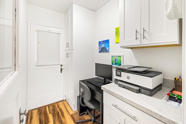 office area with hardwood / wood-style flooring