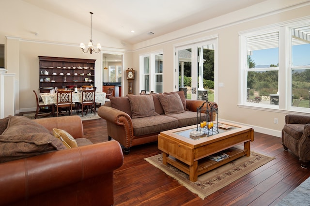 living room featuring an inviting chandelier, lofted ceiling, and dark hardwood / wood-style floors