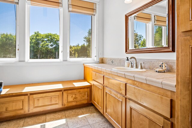 bathroom with vanity and tile patterned flooring