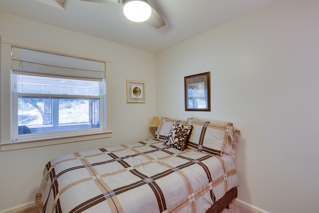 bedroom featuring ceiling fan and carpet flooring