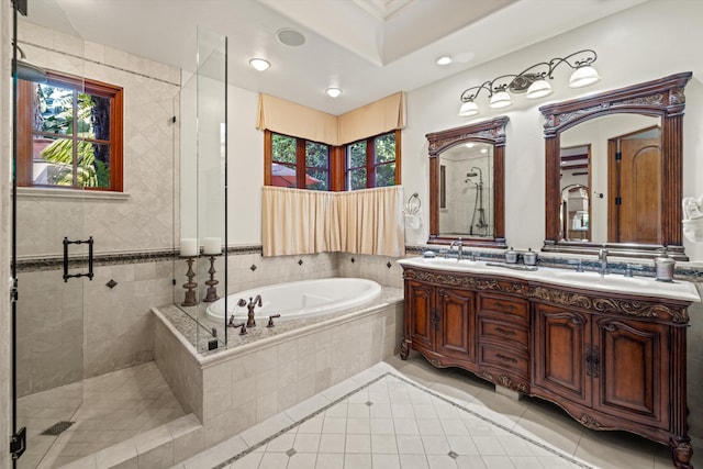 bathroom featuring tile patterned flooring, vanity, and independent shower and bath