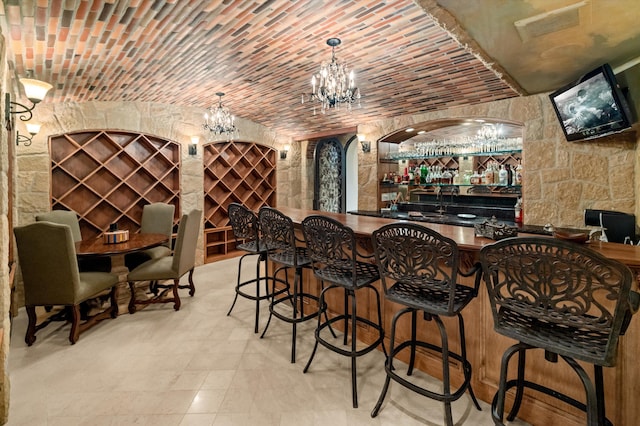 interior space featuring brick ceiling