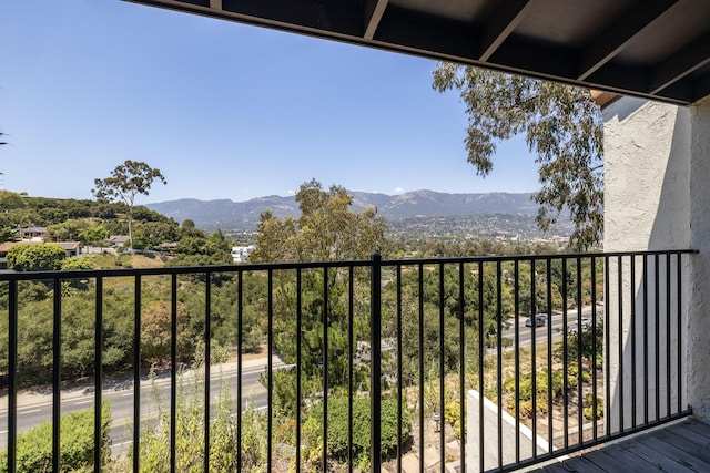 balcony featuring a mountain view