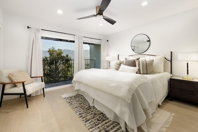 bedroom with light hardwood / wood-style flooring, access to outside, and ceiling fan